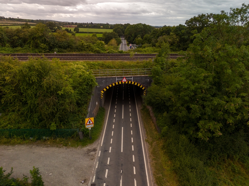 Aerial,View,Of,A,Road,Passing,Under,A,Railway,Bridge