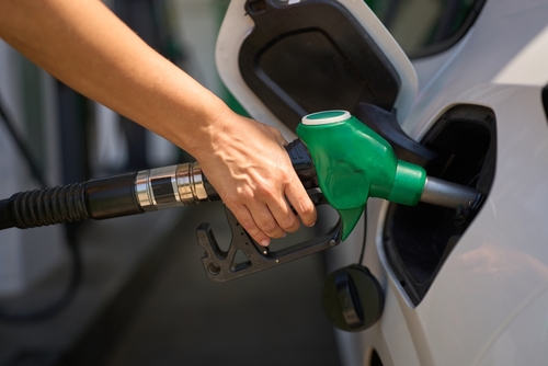 Driver,Pumping,Gasoline,Fuel,In,Car,At,Gas,Station,